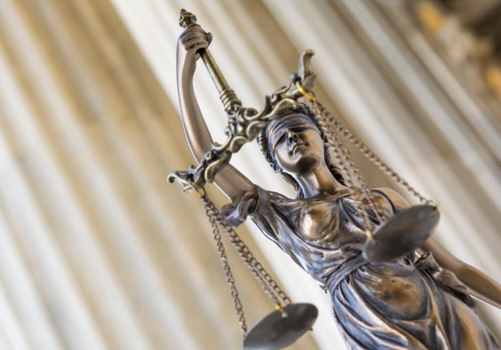 The statue of justice Themis or Iustitia, the blindfolded goddes