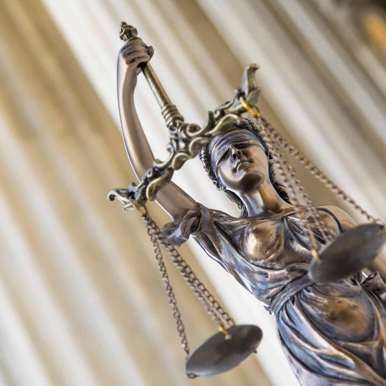 The statue of justice Themis or Iustitia, the blindfolded goddes